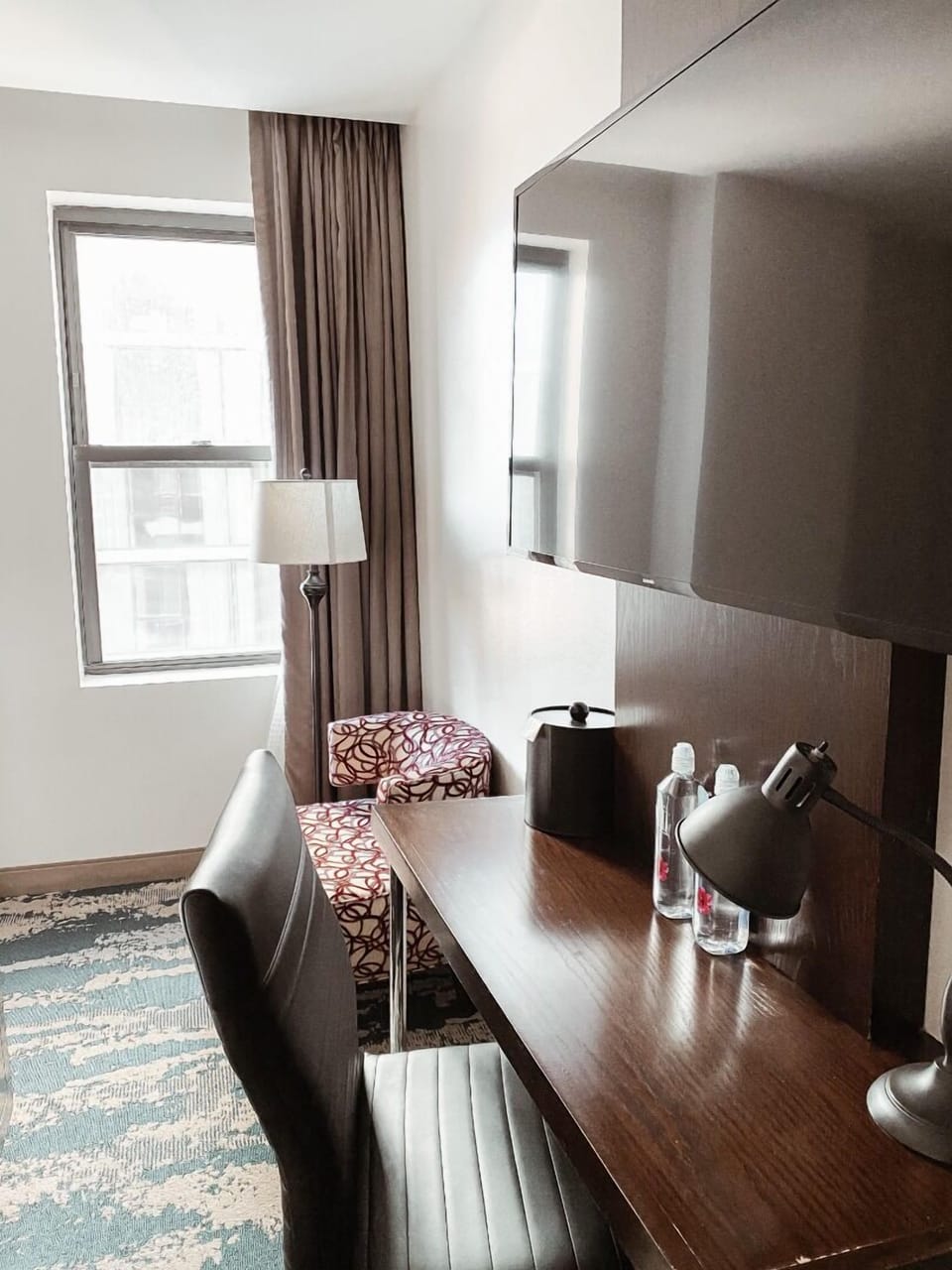 Settle in and work comfortably at the bright in-room desk.
