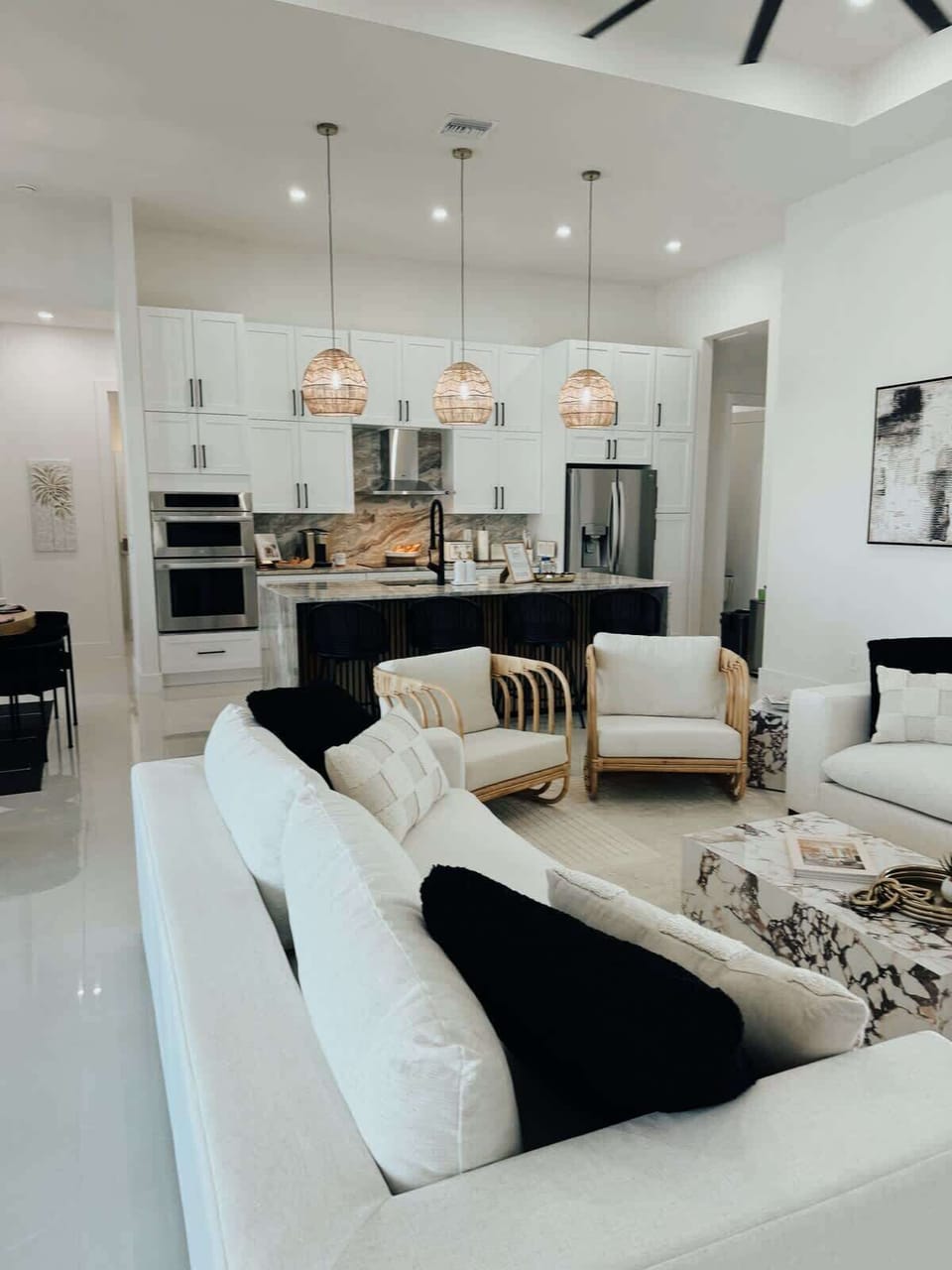 Spacious living room with cozy seating and a smart TV for relaxing nights in.