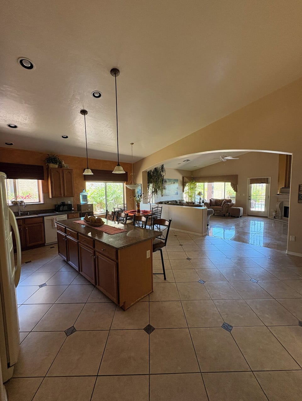 Open concept kitchen, nook, and family room