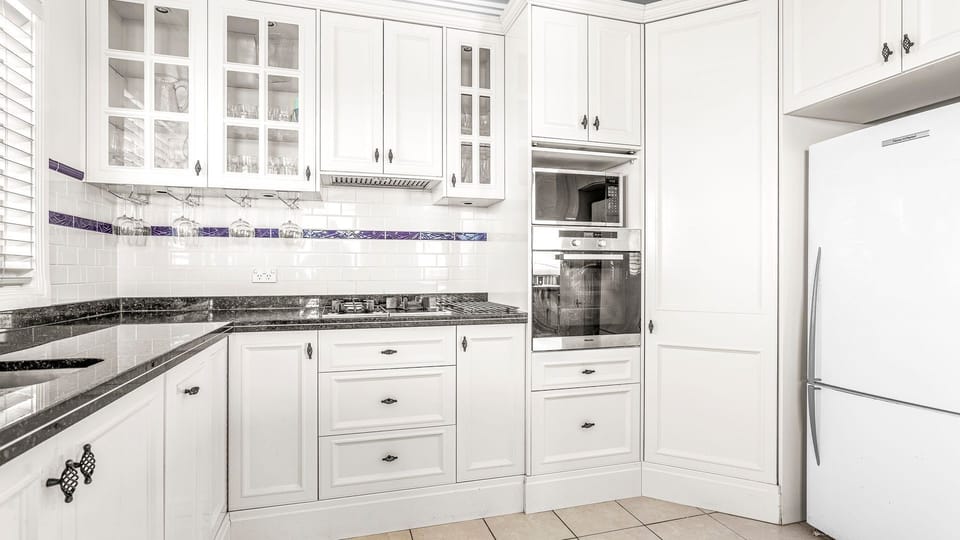 Stylish kitchen with modern appliances and plenty of counter space.