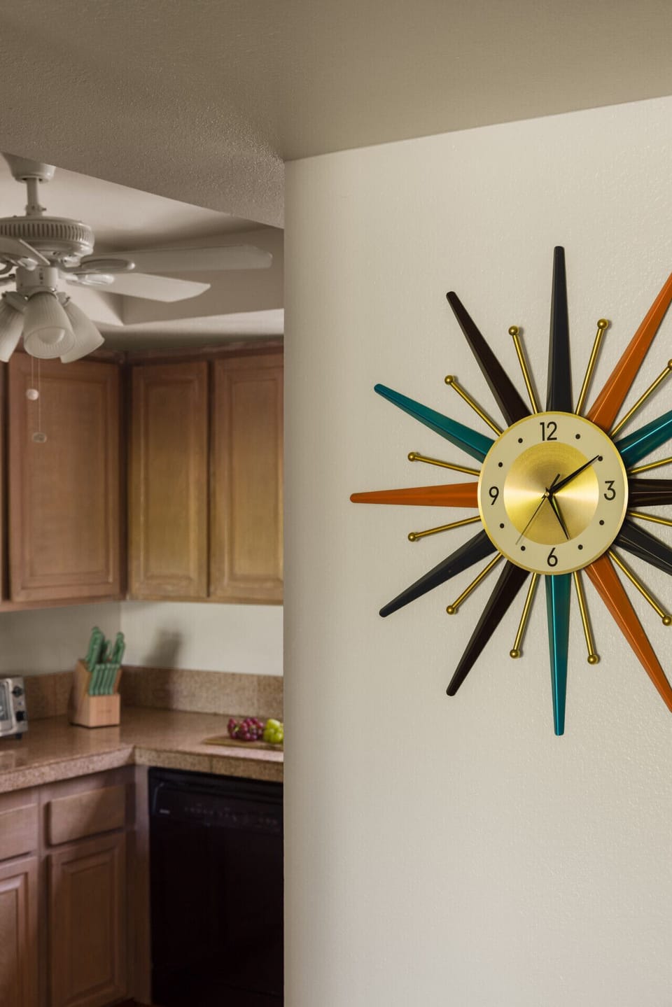This eye-catching sun-inspired wall clock brings a radiant and stylish vibe to the interior.