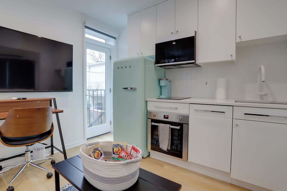 Kitchen and work desk under the TV