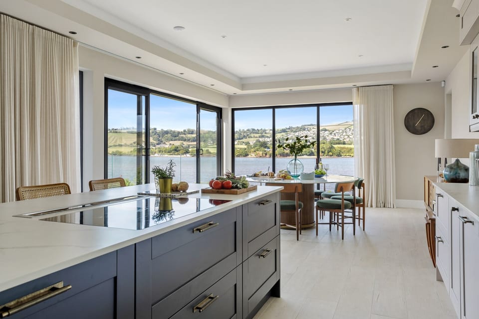 Kitchen towards dining room and river views