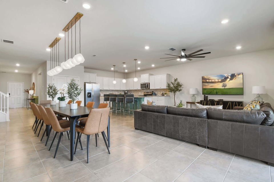 Cook, dine, and socialize seamlessly in this fully equipped kitchen that opens to the living and dining areas for the perfect family experience.