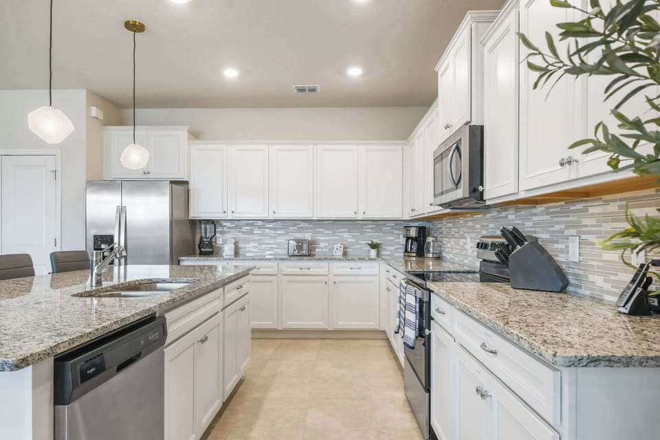 Cook like home with stainless steel appliances, granite countertops, and all essentials included.