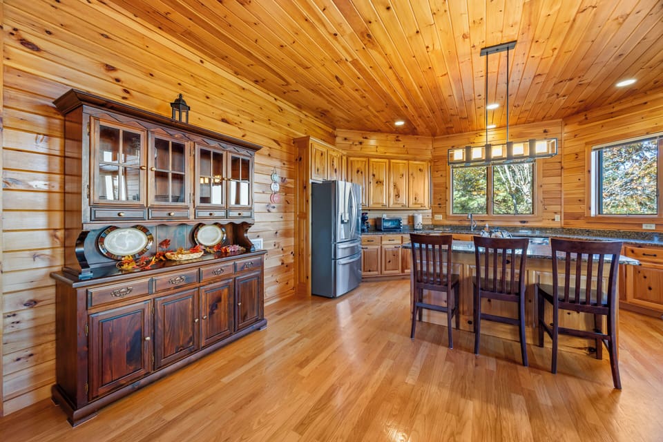 Big kitchen with granite island that seats three. Enjoy meals or coffee here. 