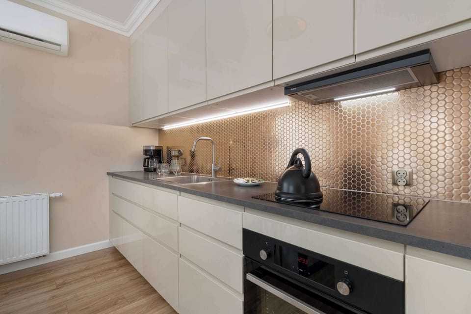 The kitchenette's practical layout maximizes space and functionality.