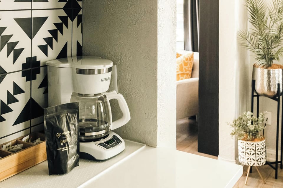 Drip coffee maker with coffee provided