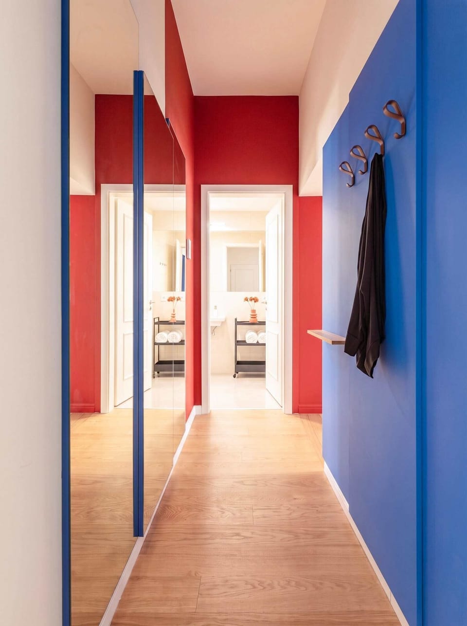 Hallway with mirrors and hangers