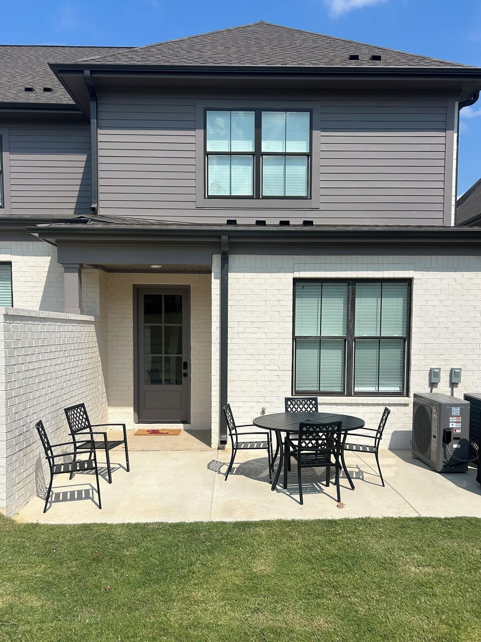Back Patio: 6 Chairs, Round Table, Television (movable mount) and Gas Grill.