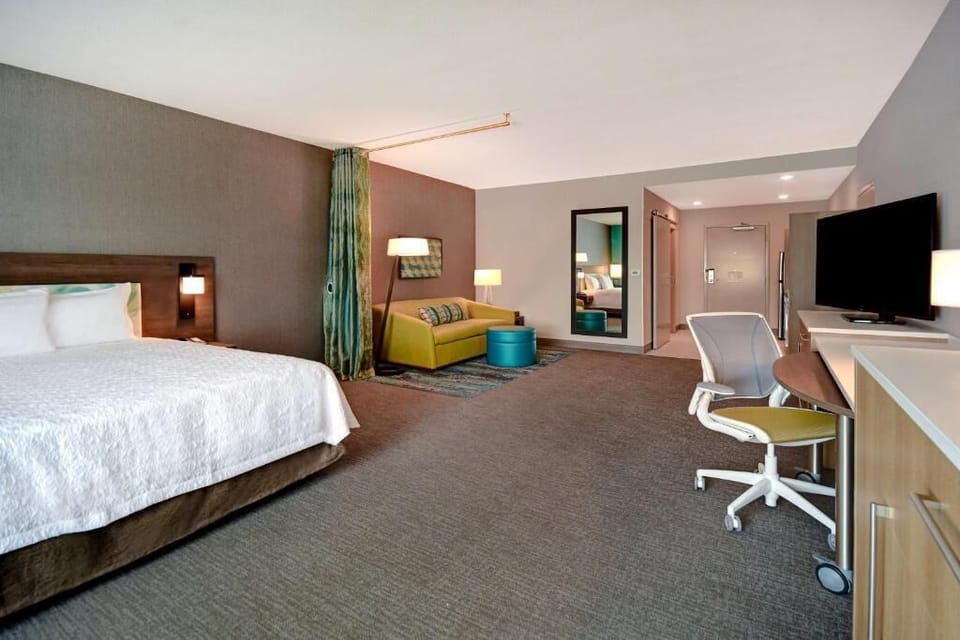 Arrive and feel at home in this open, calming suite.