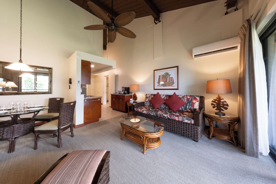 Gather and relax in a cozy living area with island seating.