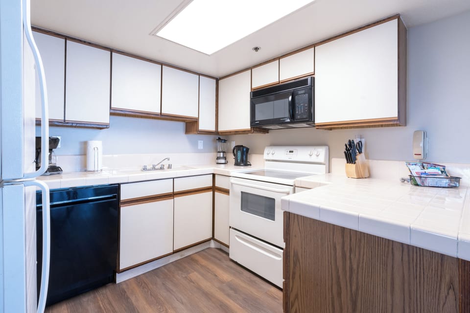 Cook easy vacation meals in the bright, full kitchen.