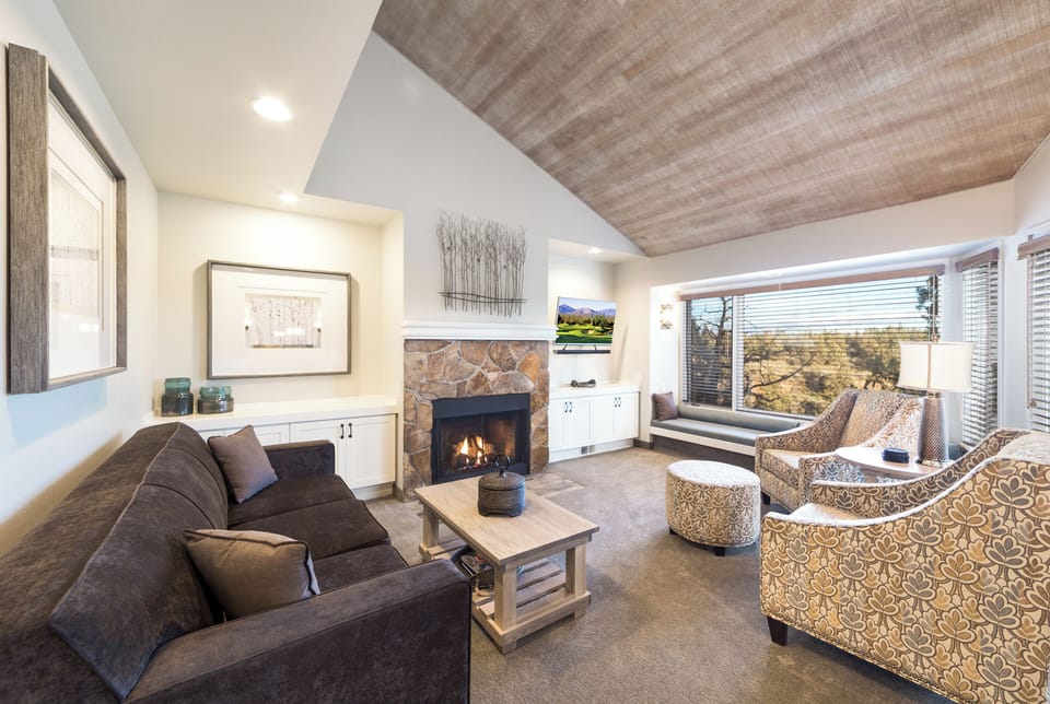 Gather by the glowing fireplace for cozy, effortless evenings.