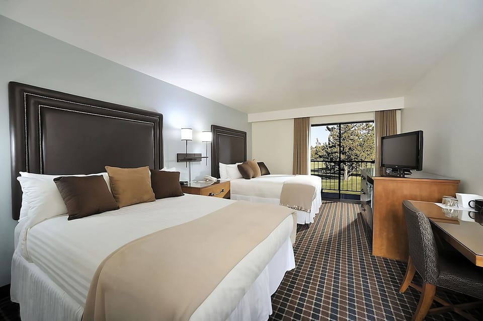 Settle into crisp linens with a view and roomy layout