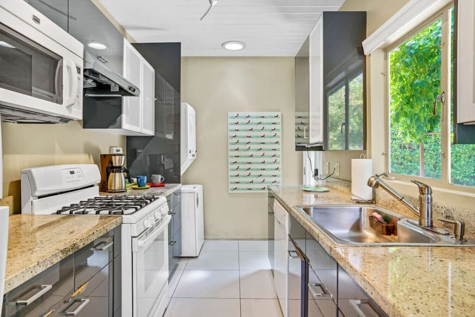 Sleek counters and plenty of prep space.