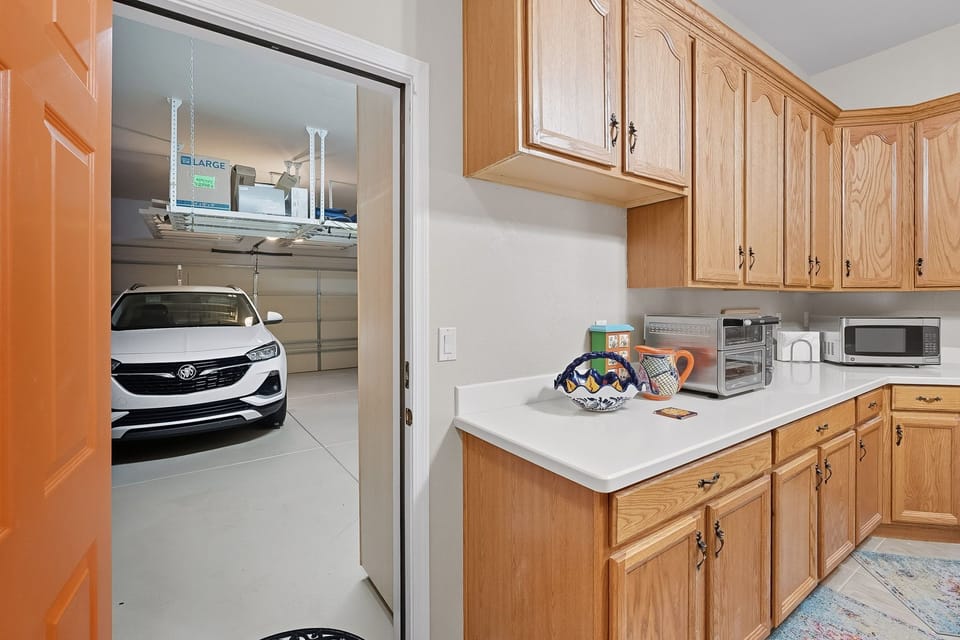 Shared Garage: Entry to Private Casita Kitchen (Host enters through Courtyard)