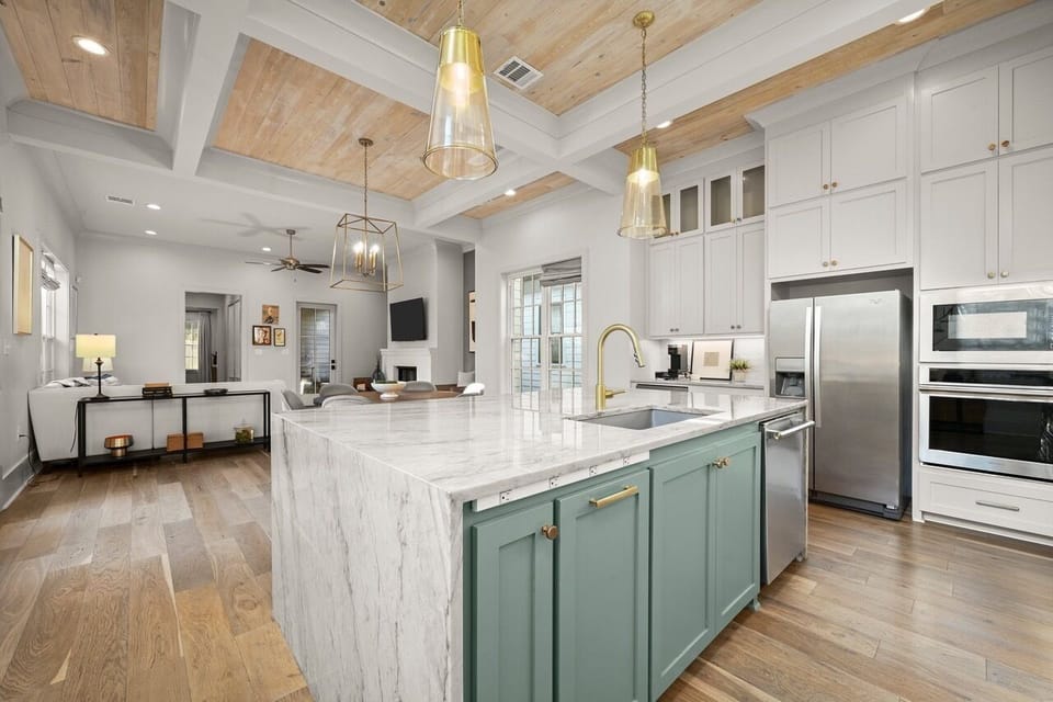 Waterfall granite countertops in the very modern and luxurious kitchen