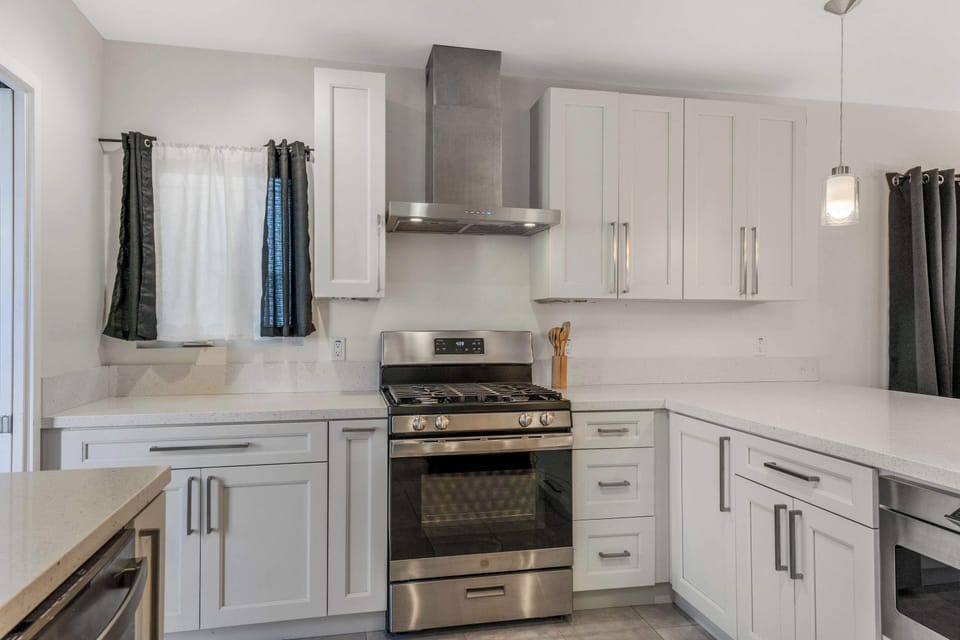 Stainless steel oven. Bakeware options provided.