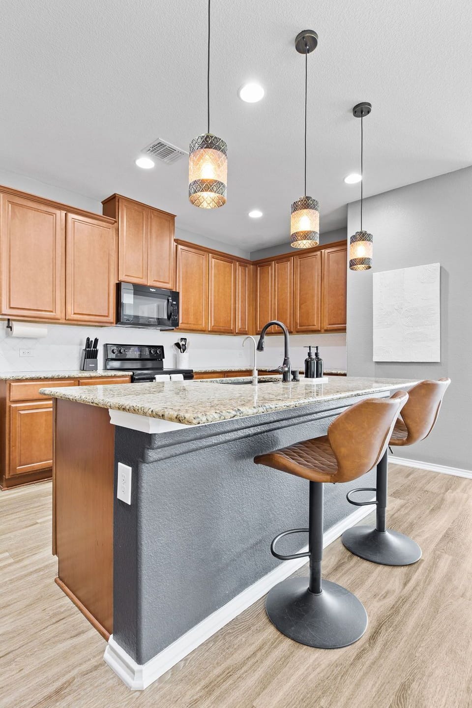 Fully equipped kitchen with modern appliances and plenty of counter space.