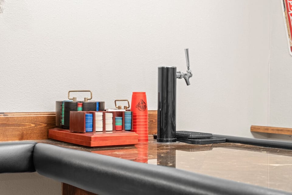 Home Bar | Western-Inspired Entertainment Space with Counter Seating, Pendant Lighting & Rustic Decor