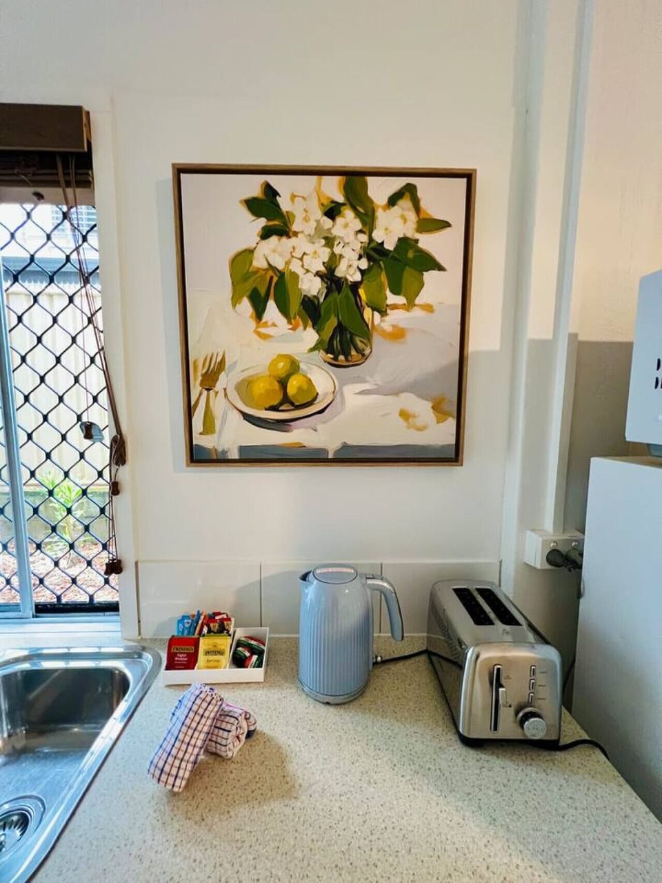 Fully equipped kitchen with modern appliances, including stove, oven, fridge, and microwave. Enjoy cooking with all the essentials provided, ample counter space, and a bright, airy atmosphere—perfect for preparing meals during your stay.