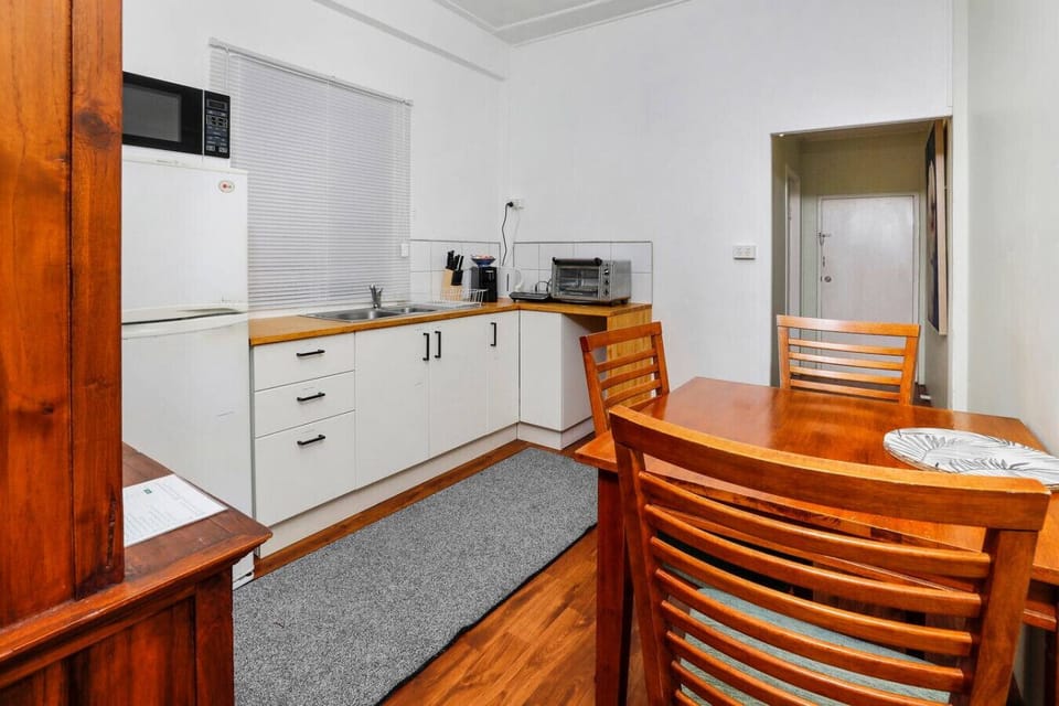 Fully equipped kitchen with modern appliances, including stove, oven, fridge, and microwave. Enjoy cooking with all the essentials provided, ample counter space, and a bright, airy atmosphere—perfect for preparing meals during your stay.
