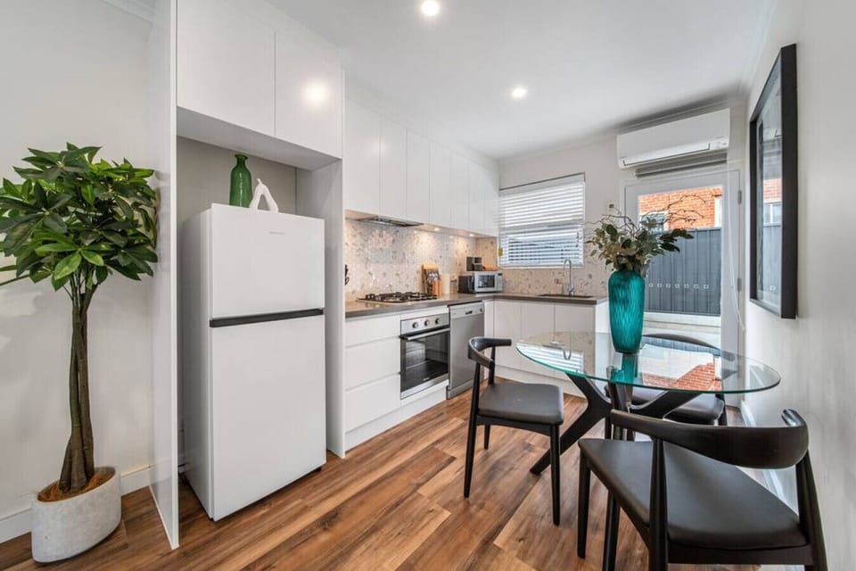 Prepare meals with ease in the modern kitchen, complete with quality appliances and space to cook at your own pace.