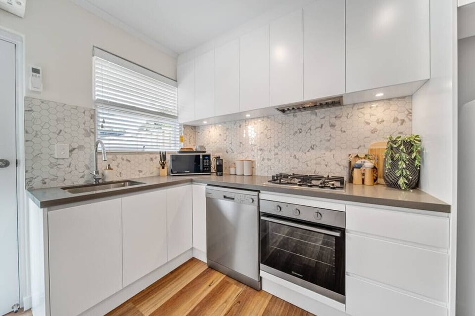 Cook with ease in the sleek kitchen, complete with quality appliances and everything you need for simple, home-style dining.