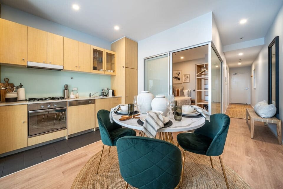 Gather at the round dining table for four — perfect for shared meals and easy conversation.
