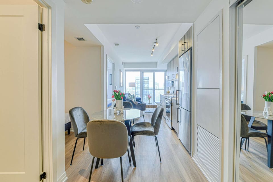 Your fully-equipped kitchen flows seamlessly into the cozy living area.