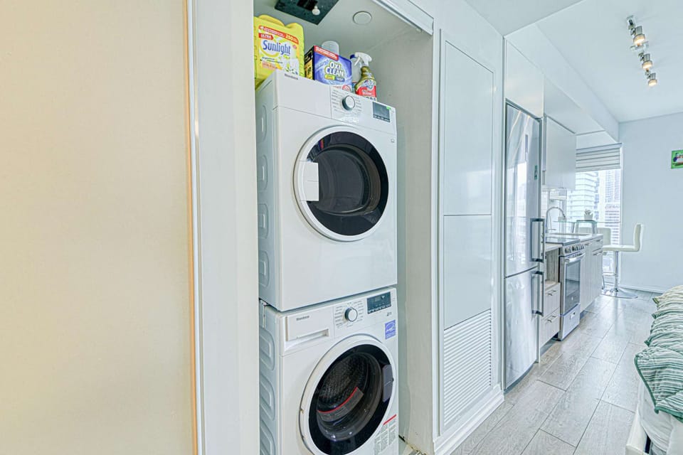 A stacked washer and dryer unit, conveniently tucked away for easy access.