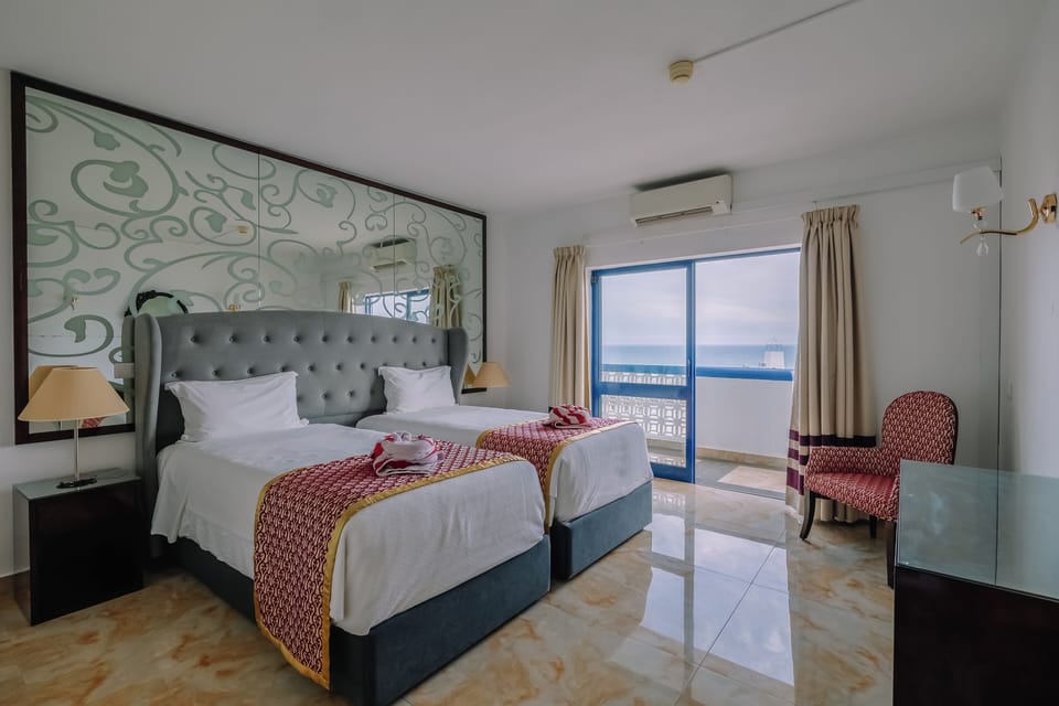 Bedroom. Exact unit will be assigned upon arrival. Views, colors and decor may vary.