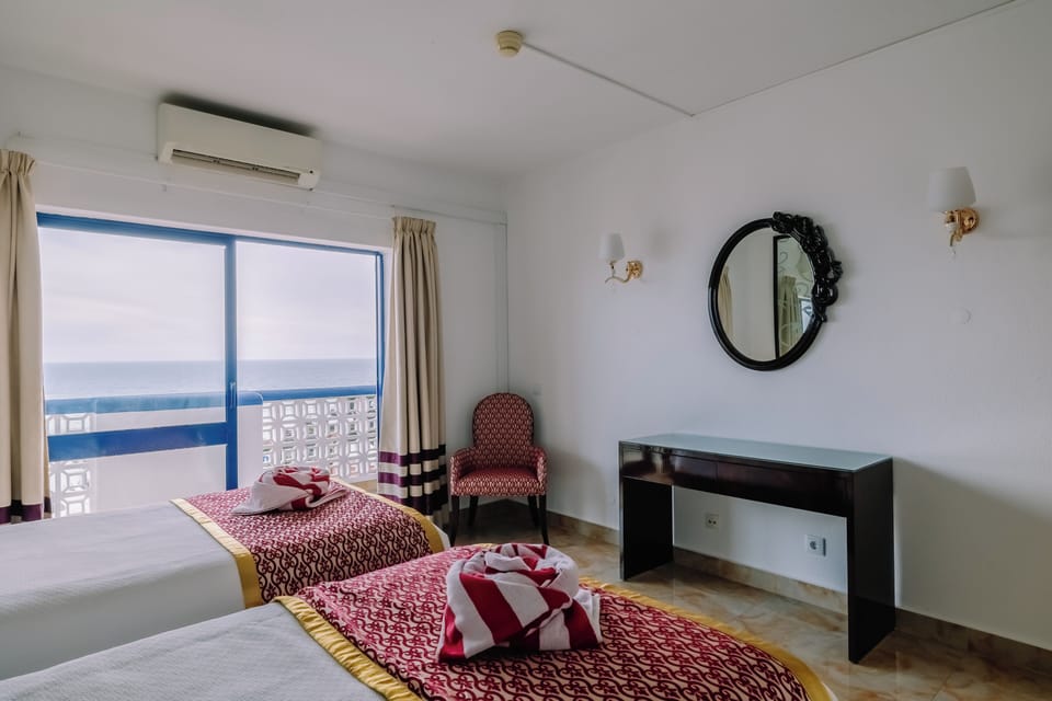 Bedroom. Exact unit will be assigned upon arrival. Views, colors and decor may vary.