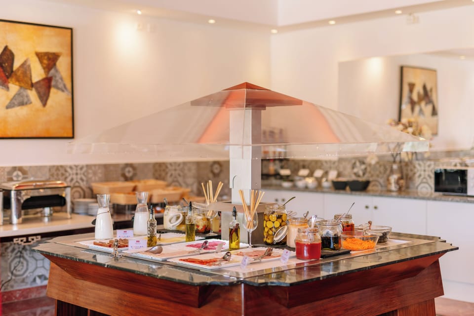 Savor curated bites and local tastes at the elegant buffet.