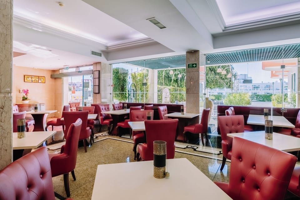 Linger over coffee in airy lounge seating with garden views.