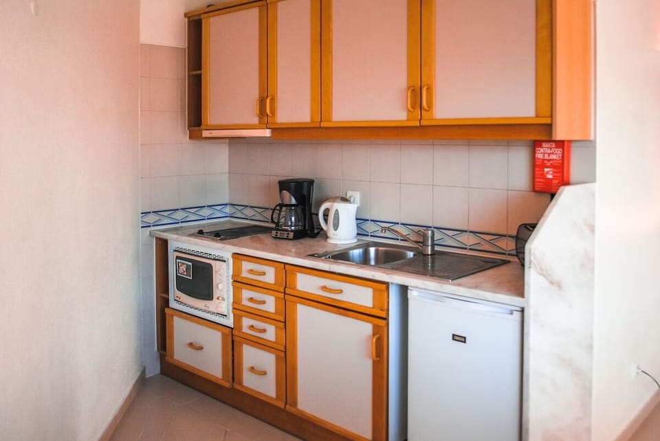 Start mornings with coffee and quick bites in the kitchenette.