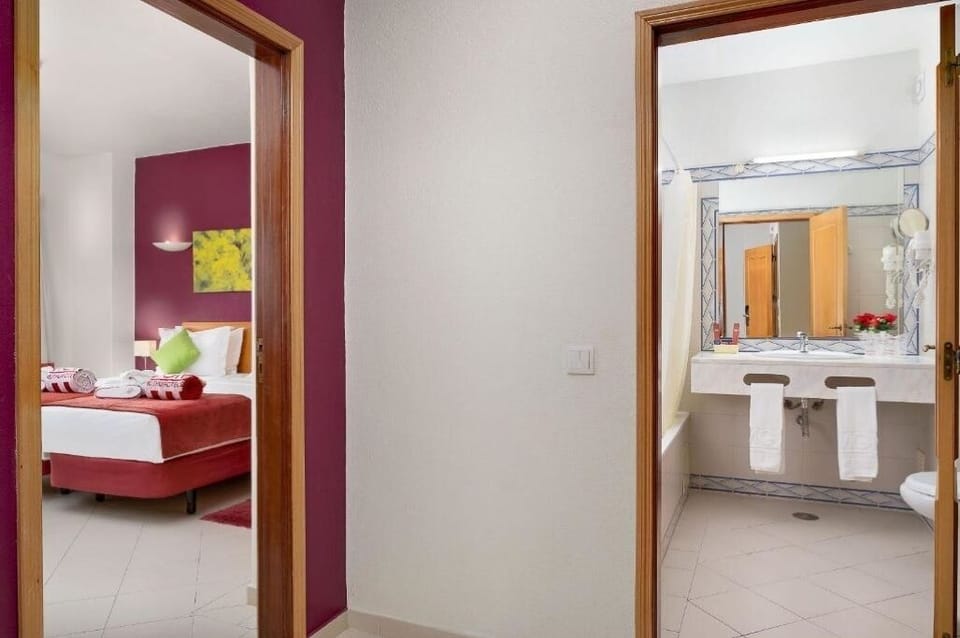 Move easily between bedroom and bath with a simple layout.