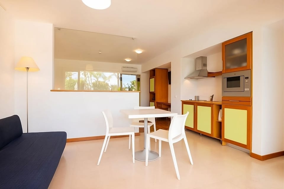 Settle into a bright living space with easy dining comfort.