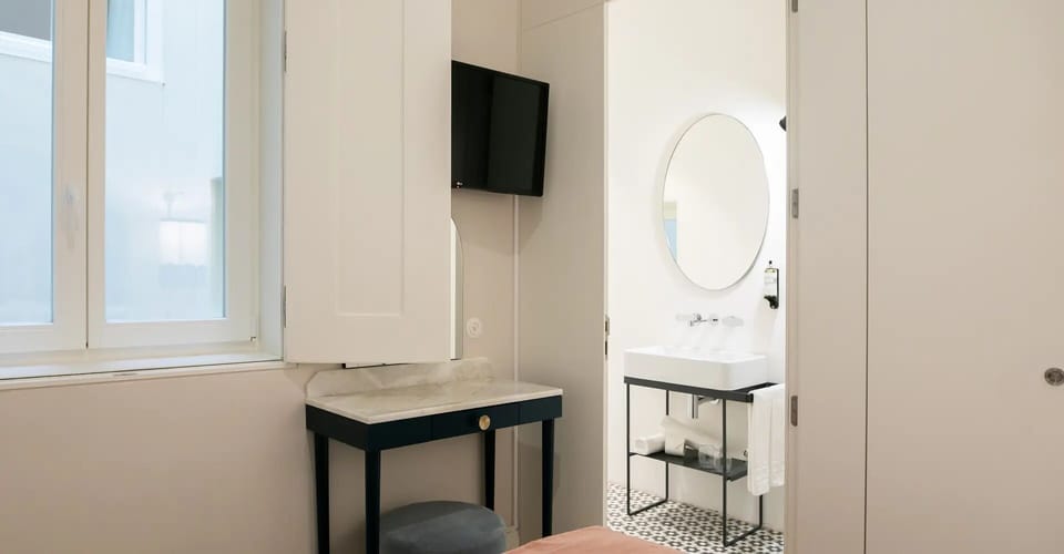 Refresh at the airy vanity with spotless, hotel-style finishes.