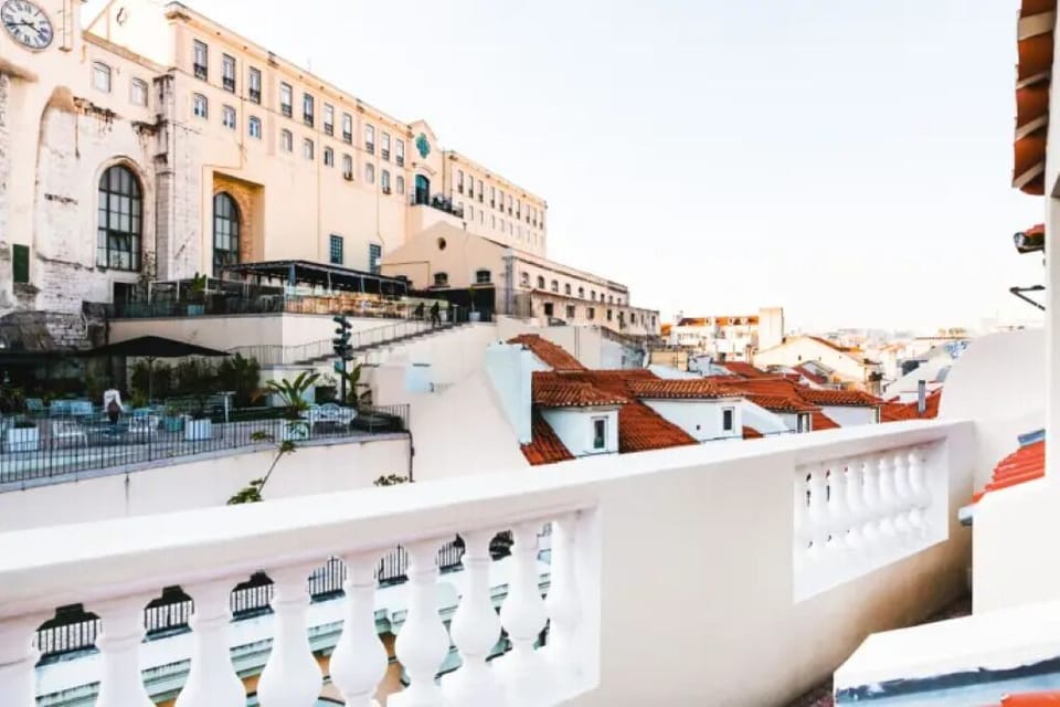 Step outside and savor sunlit terrace views over rooftops.