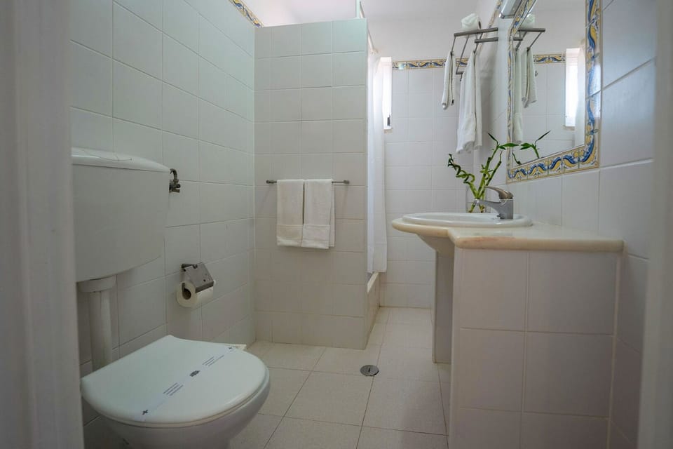 Refresh easily in a clean, practical bathroom setup.