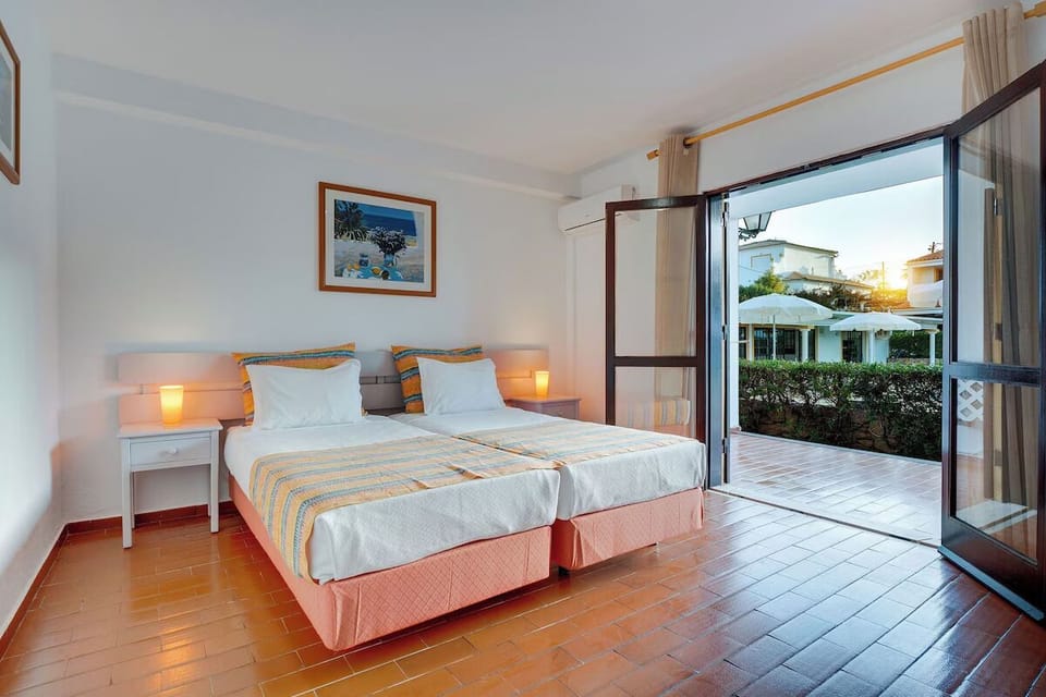Step from bed onto the terrace for golden-hour serenity.