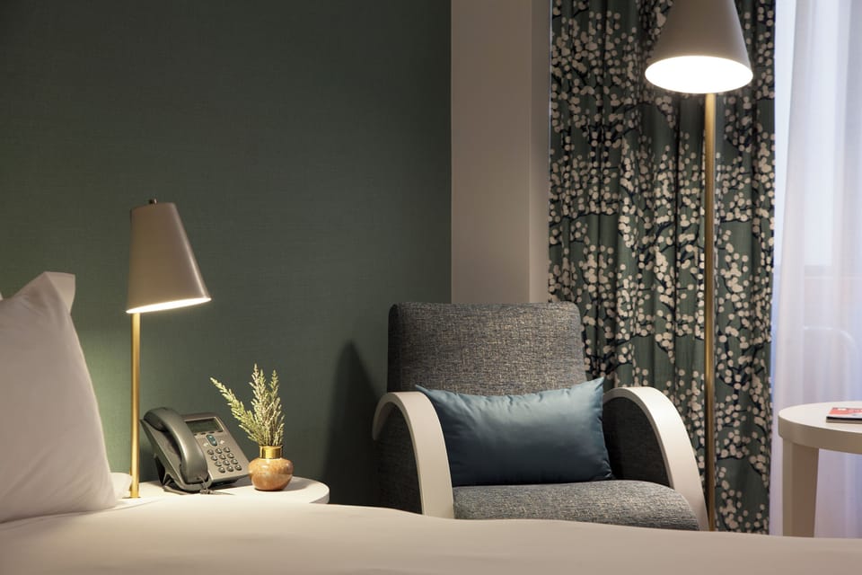 Curl up by the lamp with a book in comfort.