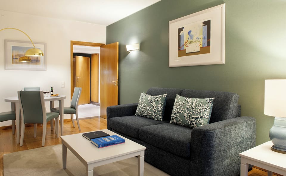 Gather on the cozy sofa after city exploring and dining.