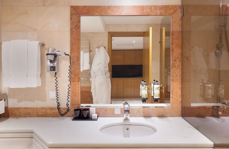 Refresh with a spotless vanity and bright, spa-like mirror.