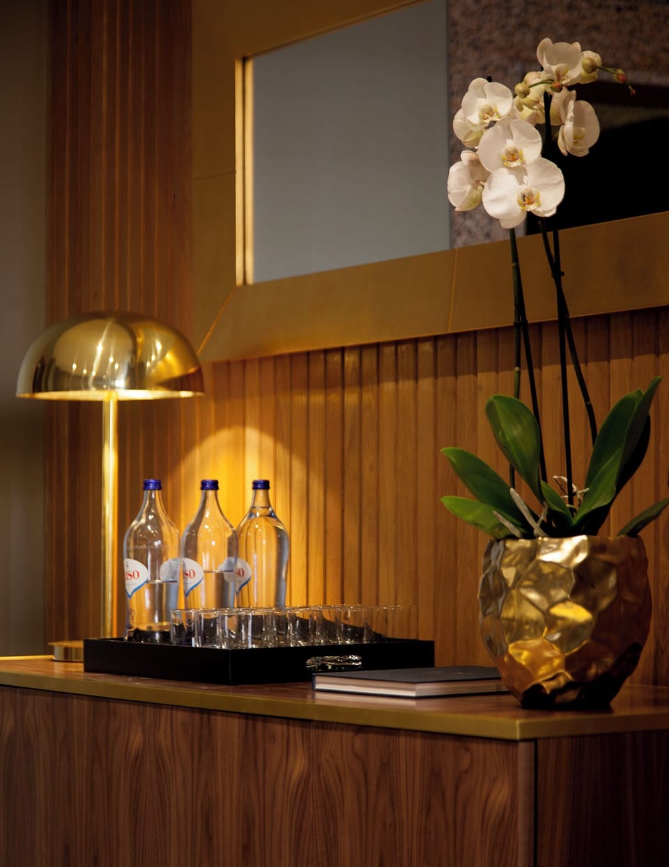Pour a welcome drink and settle into warm ambient lighting.