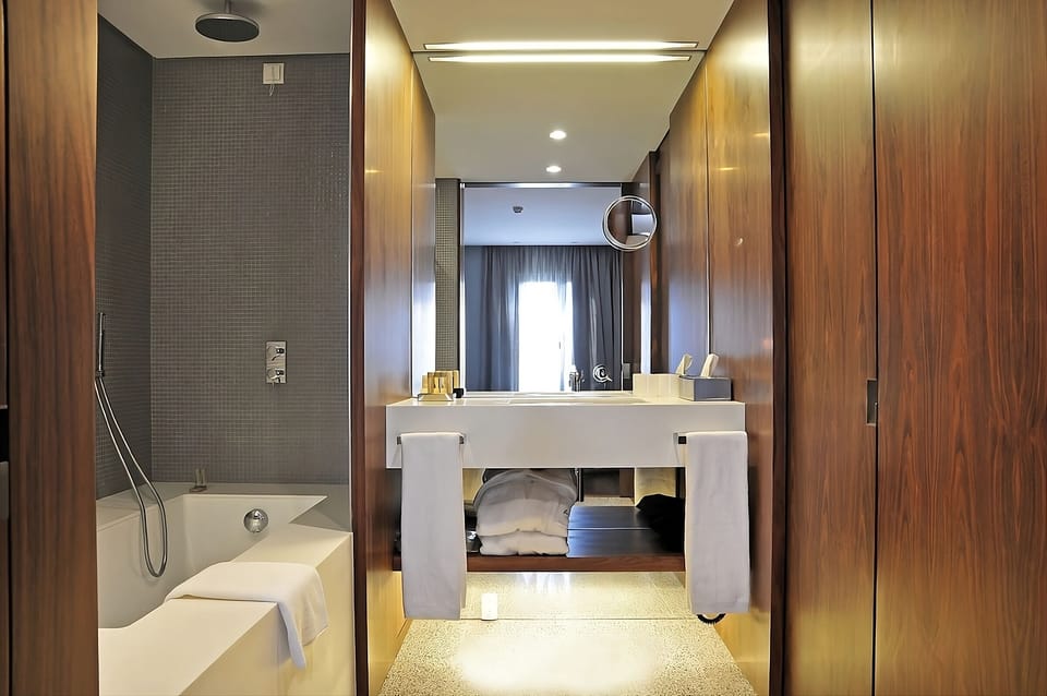 Refresh with a deep tub and rainfall shower comfort.