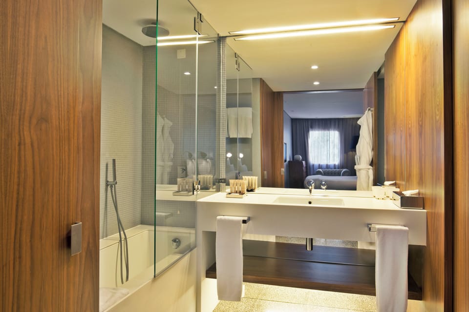 Get ready easily with a wide vanity and bright lighting.