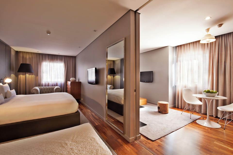 Wake up in a spacious, designer room with gentle daylight.